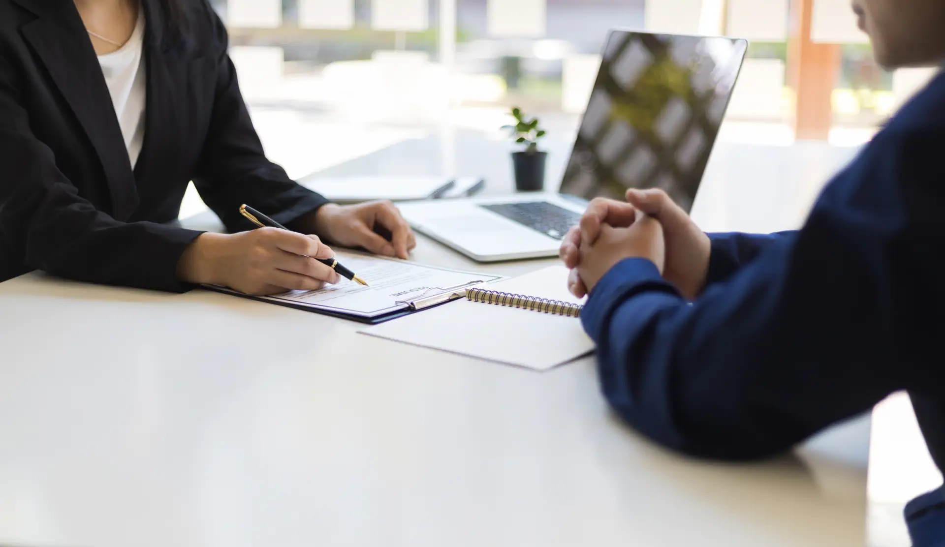 An individual in a legal office consulting for the best divorce lawyer in Singapore.